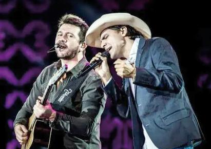 Almir Sater e o projeto “Brutos de Verdade” com Jads &amp; Jadson e João Carreiro são atrações confirmadas e levam para o palco da festa o melhor dos clássicos do sertanejo com referência às raízes do campo. A abertura da festa fica por conta de Rodrigo Haddad. (Foto/Reprodução)