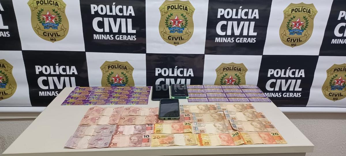 Policiais civis prenderam mais dois integrantes da quadrilha de agiotas colombianos e aprenderam dinheiro, cartão de empréstimo e celulares (Foto/Divulgação)